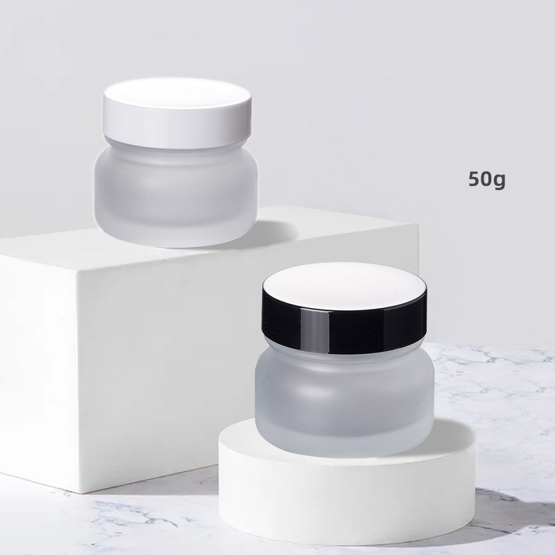 Stock Luxury Skin Care Glass Jar 50g Empty Frosted Cosmetic Packaging with Black Lid and Glass Bottle Plastic Cap White Disc